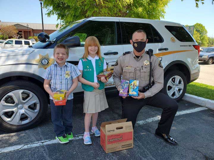 Girl Scout troop donates cookies to sheriff’s office